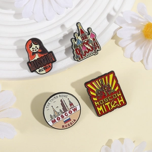 Set of Moscow enamel pins featuring St. Basil’s Cathedral and Russian matryoshka doll style