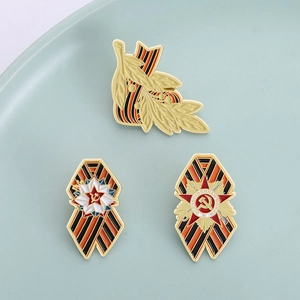 Three Soviet Union theme badges with hammer sickle emblem and George ribbon on cyan background