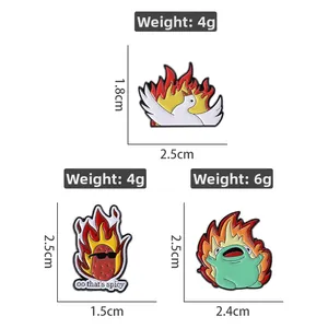 Cartoon-Anstecknadel-Set mit Flammenfrosch und weißem Vogel inklusive Maßen