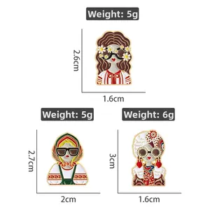 Three Russian style vintage enamel pins with sizes and weights on white background