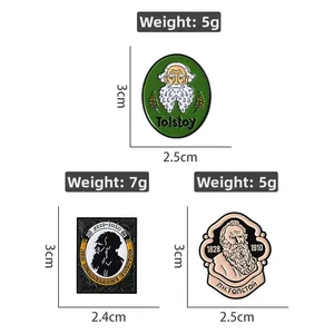 Three Tolstoy enamel pins featuring portrait designs on a white background