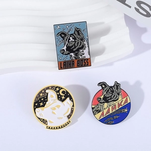 Vintage Soviet Space Dog Laika enamel pin set featuring retro colors and metallic finish