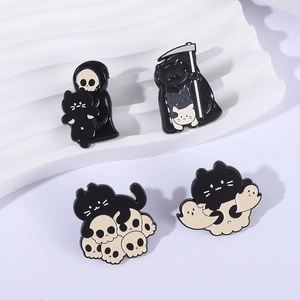 Set of four spooky Halloween black cat enamel pins featuring skull and reaper themes