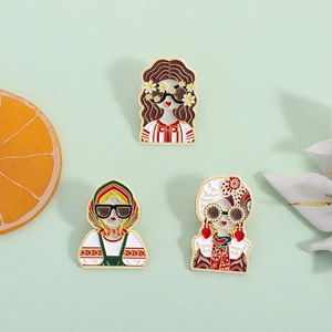 Three colorful cartoon enamel pins featuring girls in traditional Russian folk costumes