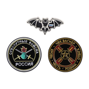 Three-piece Russian military enamel pin set with bat and Wagner Group metal badges