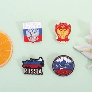Russian double-headed eagle and Kremlin enamel pins set on a decorative background