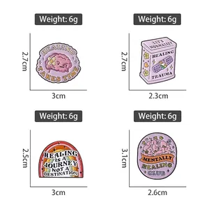 Pink mental health enamel pin set with brain and medicine box designs for self-healing
