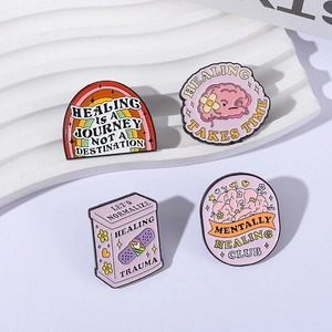 Set of 4 pink mental health healing enamel pins featuring brain and motivational text