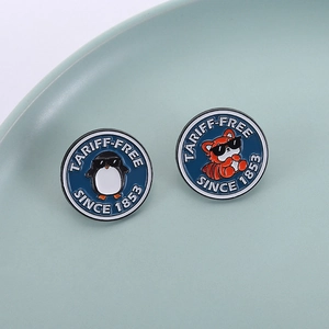 Set of two round enamel pins featuring cartoon penguin and red panda in deep blue