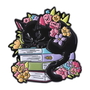 Floral black cat sleeping on books enamel pin made of zinc alloy with colorful flowers