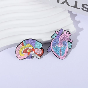 Creative anatomical brain and heart enamel pins with professional medical English labels