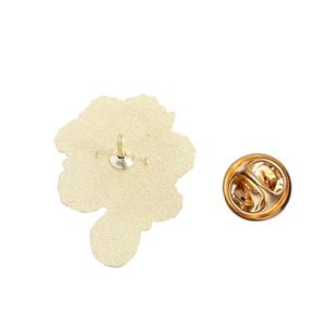 Detail der Sonnenblumen-Brosche Rückseite mit goldenem Metallsockel und Schmetterlingsverschluss