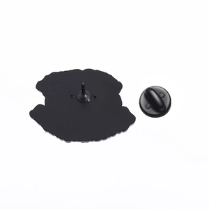 Detail view of the black enamel pin back with durable rubber clutch fastening