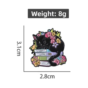 Cartoon black cat sleeping on colorful books with flowers enamel pin badge, 3.1cm x 2.8cm