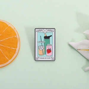Three of Cups tarot style enamel pin featuring coffee and soda on a mint green base