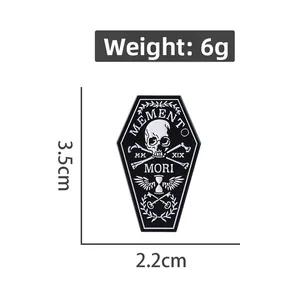 Gothic coffin enamel pin with Memento Mori skull and bones design, 3.5cm x 2.2cm