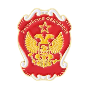 Detail of Russian Federation enamel shield pin with golden double-headed eagle crest
