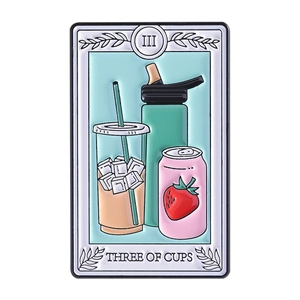 Three of Cups tarot brooch featuring modern drinks and straw on a minimalist metal pin