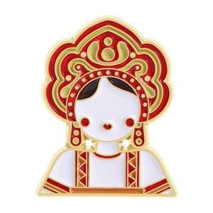 Retro Russian Matryoshka doll enamel pin with traditional red and gold kokoshnik pattern