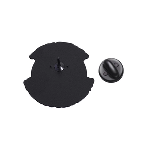 Detail view of the black metal brooch back featuring secure pin and rubber clutch backing