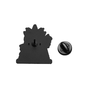 Rear view of matte black badge showing texture and rubber butterfly clutch closure