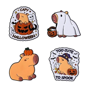 Set of four Capybara Halloween enamel pins with pumpkin lanterns and ghost costumes