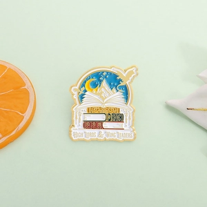 Enamel fantasy book brooch featuring mountains and moon with High Lords text