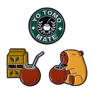 Three-piece enamel pin set featuring Yerba Mate designs and a cute Capybara animal badge