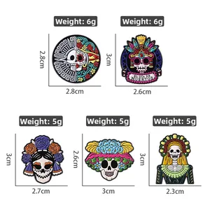 Day of the Dead colorful skull enamel pins set with floral details and metal finish