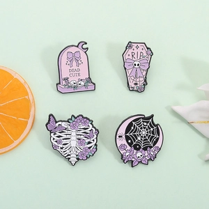 Set of 4 Goth Halloween enamel pins with pink tombstone, coffin, moon, and skull ribcage