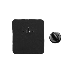 Macro view of the black metal pin back base and durable rubber clutch closure