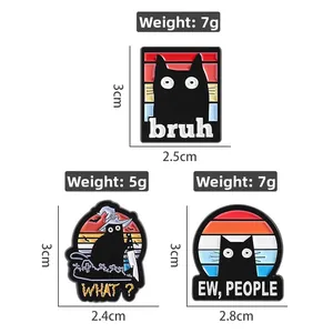Detailed view of three funny black cat enamel pins with humorous text in high quality