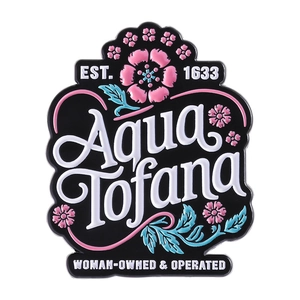 Minimalist Aqua Tofana enamel lapel pin with pink flowers and blue leaves on black metal