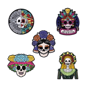 Five-piece set of colorful Dia de Muertos skull enamel pins with Day of the Dead art themes