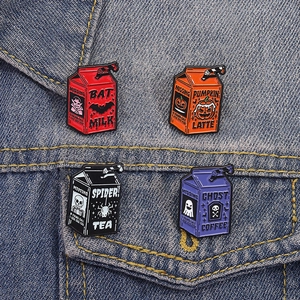 Halloween enamel pin set featuring milk carton ghost and skull designs on denim