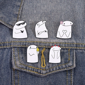 Set of 5 Flork of Cows enamel pins with cute cartoon expressions on denim fabric