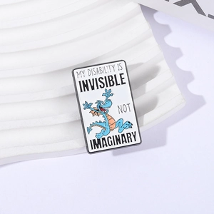 Blue cartoon dragon enamel pin with My Disability is Invisible not Imaginary text