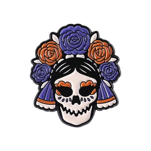 Sugar skull enamel pin with purple and orange roses for Halloween and Day of the Dead