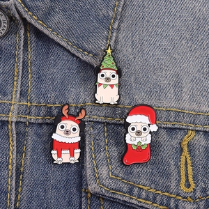 Three-piece Christmas pug enamel pin set with festive holiday themes on denim jacket