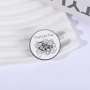 Broche artistique abstraite avec lignes noires emmêlées et texte 'I Feel Like This'