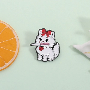 Cartoon white cat enamel pin with knife and red bow on a minimalist textured background