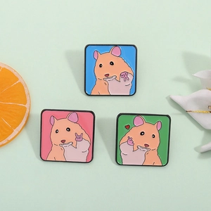 Lot de trois pin's mignons hamsters de dessin animé pour sacs et vêtements en bleu rose vert