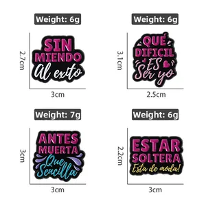 Set of four colorful enamel pins with Spanish inspirational quotes for bags and clothes
