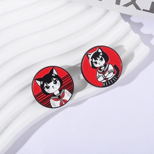 Set of two round metal enamel pins with anime cat girl designs in classic sailor uniforms