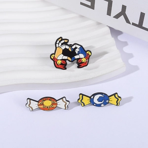 Colorful metal enamel pins set featuring heart-hand gesture and sun-moon candy designs