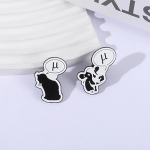 Minimalist black and white cat enamel pins set with Greek mu symbol in bubble on purple base