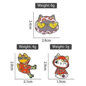 Set de broches chat en émail avec motifs floraux et lunettes de soleil tendance