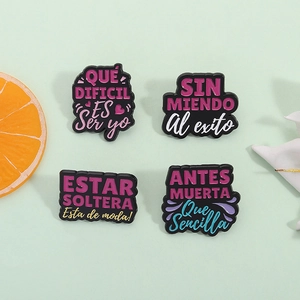Set of 4 Spanish quote enamel pins in black with colorful text on a green background