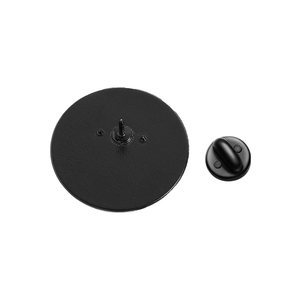 Macro shot of the matte black metal brooch back with secure rubber clutch backing