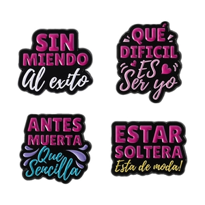 Spanish quote enamel pin set with phrases like Antes Muerta Que Sencilla for denim jackets